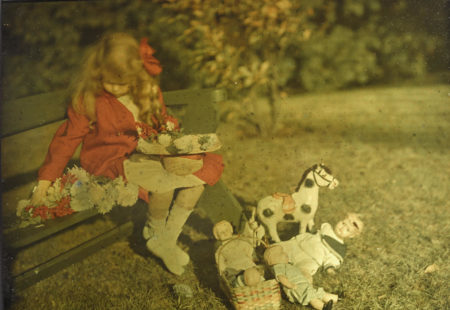 Georgia Engelhard In A Red Coat, With Flowers And Toys-1915 Georgia Engelhard In A Red Coat, With Flowers And Toys-1915