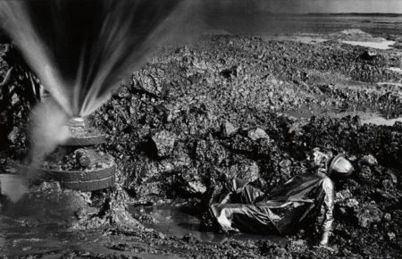 Greater Buhrman Oil Field, Kuwait (Fallen Worker) / Man Lying in Oil-1991 Greater Buhrman Oil Field, Kuwait (Fallen Worker) / Man Lying in Oil-1991