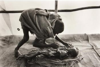 A Body Being Prepared for Burial, Korem Camp, Ethiopia-1984 A Body Being Prepared for Burial, Korem Camp, Ethiopia-1984