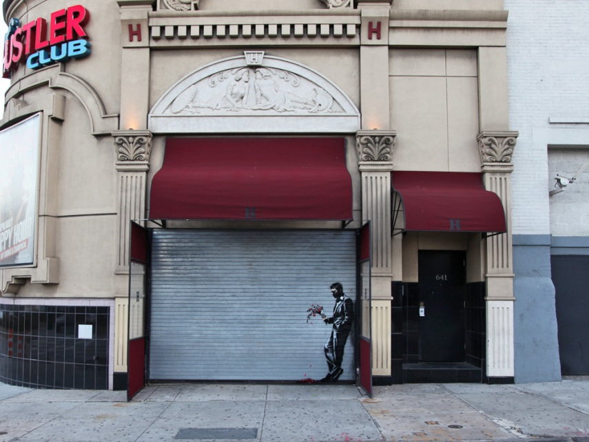 Banksy's work 'Waiting in vain…at the door of the club' on Larry Flynt's Hustler Club in Hell's Kitchen, New York, 2013