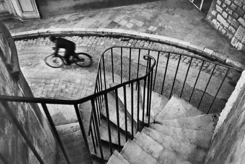 use Henri Cartier-Bresson - Man Cycling Down Street, Hyeres, France, 1932