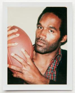 Andy Warhol, Polaroid Photograph of OJ Simpson Holding a Football, 1977
