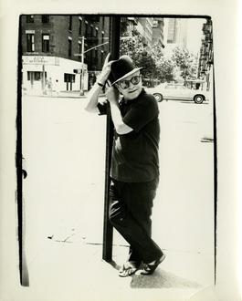 Truman Capote Leaning on a Street Lamp