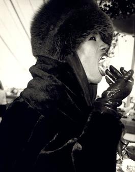 Andy Warhol, Photograph of Grace Jones Eating Cake, 1986