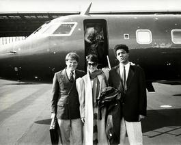 Andy Warhol, Photograph of Jean-Michel Basquiat, Richard Weisman and an Unidentified Woman by a Jet