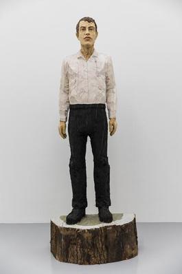 Man with black trousers and white shirt