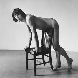 Daniel Schock Leaning Against Chair