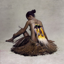 Young Woman with Paradise Birds, New Guinea