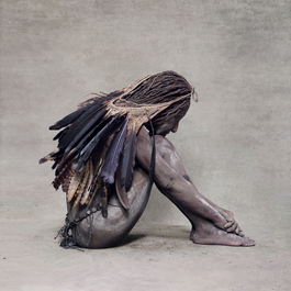 Woman with Feather Bag, New Guinea