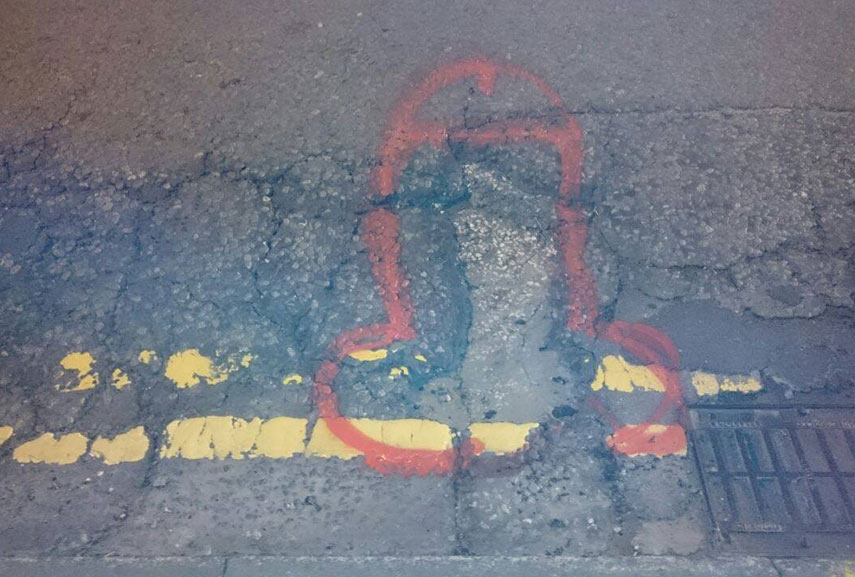 woman asked a question - around the city, particularly street next to school, do people like penises drawn around potholes?