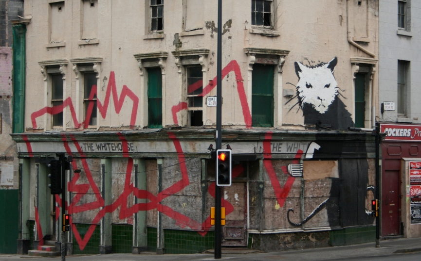 Seven-Figure Banksy <em>Spy Booth</em> Vandalized