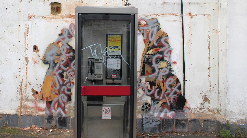 Seven-Figure Banksy <em>Spy Booth</em> Vandalized