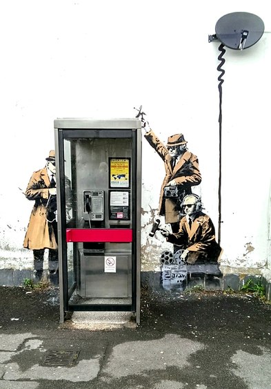 Banksy's Spy Booth in Cheltenham, via Wikipedia