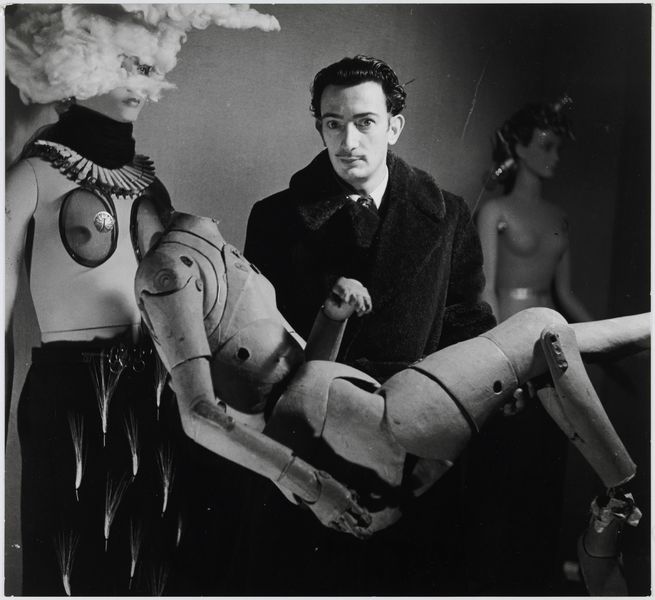 Denise Bellon - Salvador Dalí and his mannequin at the Exposition Internationale du Surréalisme, Paris, 1938