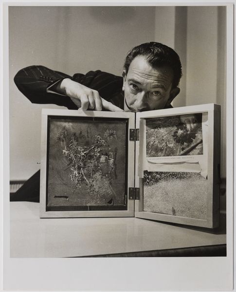 Martha Holmes - Salvador Dalí with the oil painting The Servant of the Disciples of Emmaus and studio material, ca. 1960