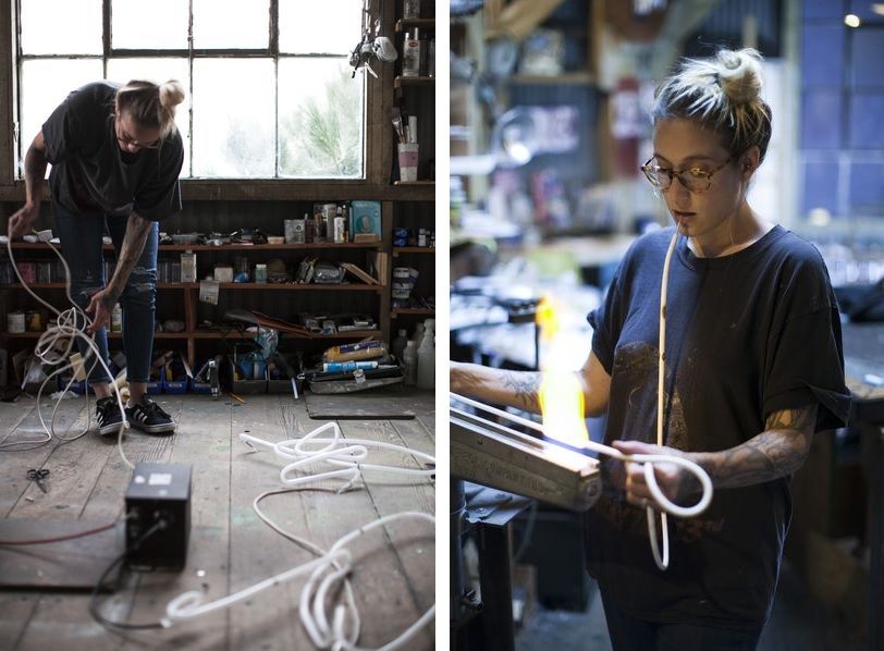 Meryl Pataky working on an original neon abstract sign wall design