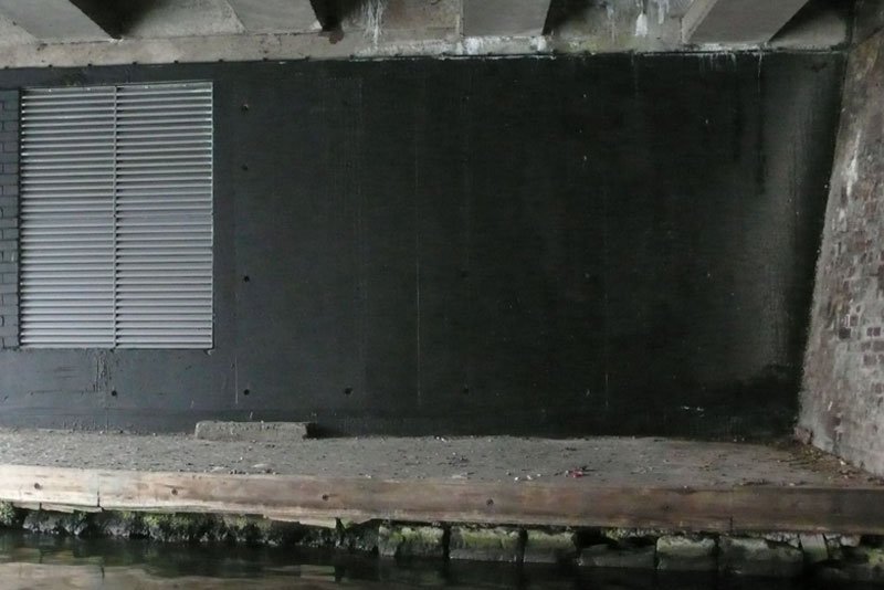 Wall painted in black again by anonymous third-party, 2010