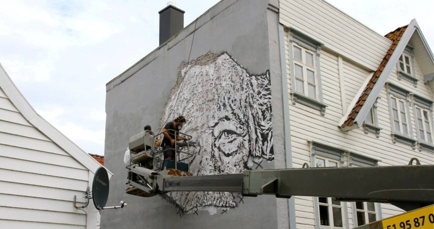 to understand the meaning of street art take a look at Vhils as he draws